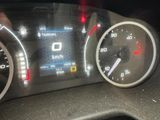 a close up of a car dashboard with a speedometer