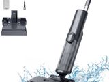 a close up of a vacuum cleaner with a brush on top of it