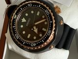 a watch in a box with a price tag on it