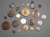 a lot of coins that are sitting on a table
