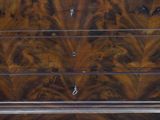 a wooden chest of drawers with many drawers on it