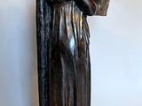 statue of a woman holding a harp on a white background