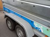 an image of a trailer that is parked in a lot