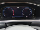the dashboard of a car with two gauges and a steering wheel