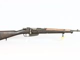 an old rifle with a wooden barrel on a white background