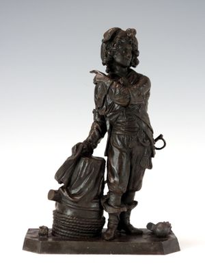 statue en bronze représentant un homme avec un seau et un chien