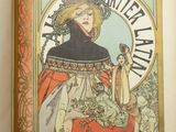 an old book with a picture of a woman holding a cat