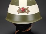 an army helmet with a cross on the side and a star on the side