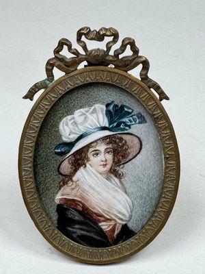 an image of a picture of a woman wearing a hat and scarf