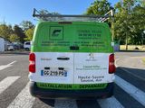 a van that is parked on the side of the road