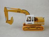 a toy excavator that is sitting on a table