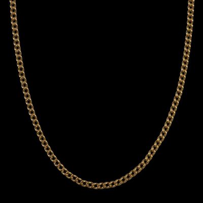a gold chain on a black background