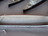 a surfboard that is sitting on a table in a room