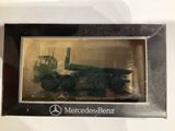 a picture of a mercedes - benz truck in a box