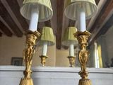 two lamps that are sitting on a table