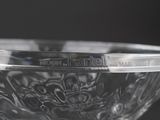 a close up of a glass bowl on a table