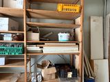 a room with a lot of boxes and boxes on the shelves