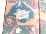 a close up of a book with a label on it