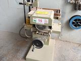 a machine that is sitting on the floor in a room