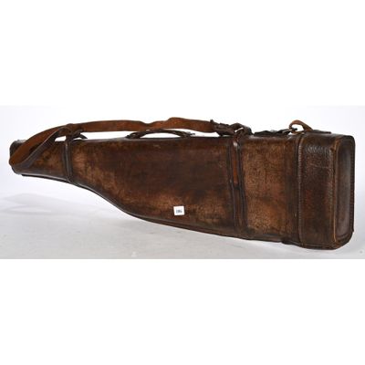 image d'un étui à arme muni d'une poignée en cuir, sur fond blanc