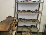 a room with a bunch of old tools on the shelves