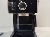 an image of a coffee machine on a table
