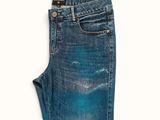 a close up of a pair of jeans on a white background