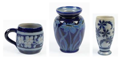 four different types of vases and cups are shown in a row