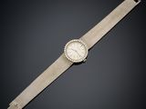 an 18k gold and diamond wristwatch, by cartier