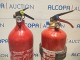 two fire extinguisors sitting next to each other