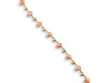 Bracelet en or jaune 14 carats orné de perles de quartz couleur pêche