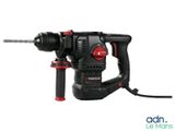 a close up of a drill with a cord attached to it