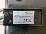 a close up of a metal box with a label on it