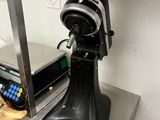 a machine that is sitting on a counter in a kitchen