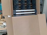 a large cardboard box with a bunch of items inside of it