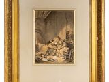 une photo encadrée représentant une femme et un enfant dans une pièce
