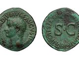 an ancient coin with the head of a man in profile and the head of a woman in profile