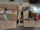 many boxes that are sitting on the floor together