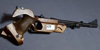a gun that is sitting on a table
