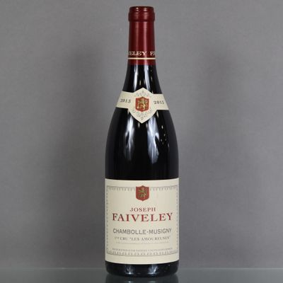 a bottle of wine that is sitting on a table