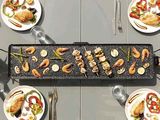 several plates of food on a table with silverware and forks