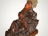 an image of a statue of a man with a crown on his head
