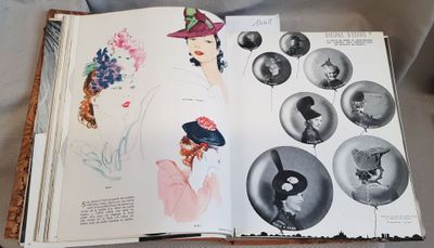 an open book with a picture of a woman in a hat on it