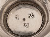 an overhead view of a bowl with a lot of dirt on it