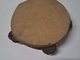a small piece of cardboard on a white surface