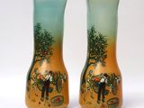 two vases that are sitting next to each other