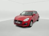 a red car is parked in a white room with a white wall