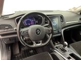 a picture of the interior of a car with a steering wheel and dashboard