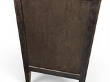 an image of a black and brown cabinet with a marble top