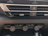 a picture of a car dashboard with a camera mounted on it